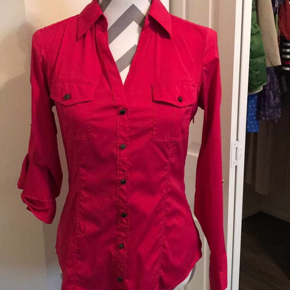 Pink/Fuschia top. Comfortable and stretchy.
